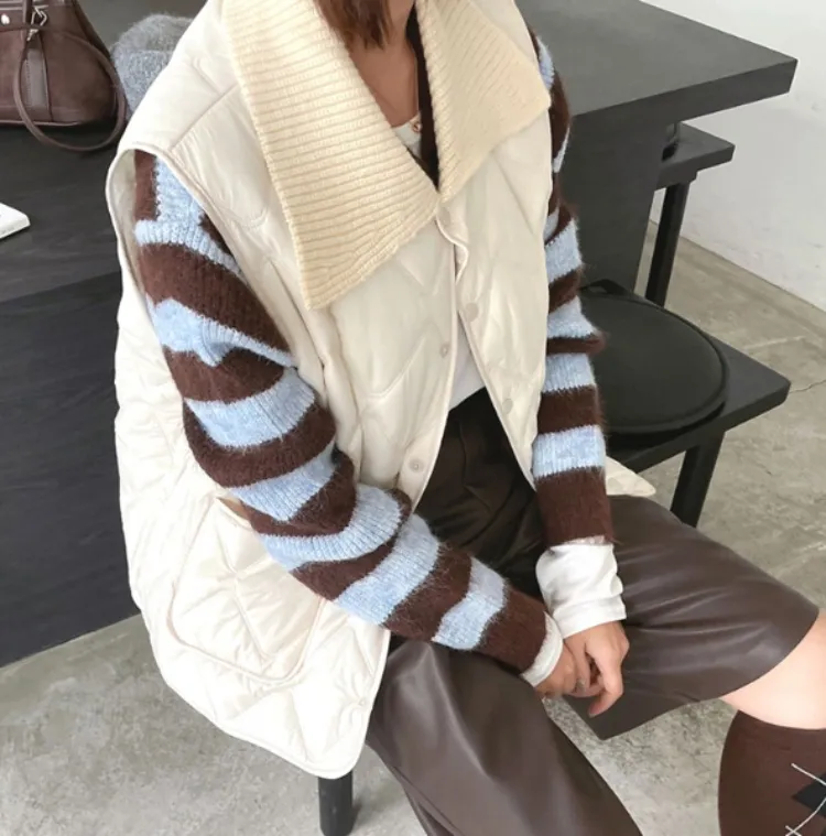 가볍고 따뜻한 착용감이
매력적인 패딩조끼